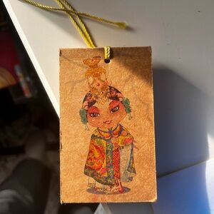 Japanese Brown Paper Notebook with a little guy on the front